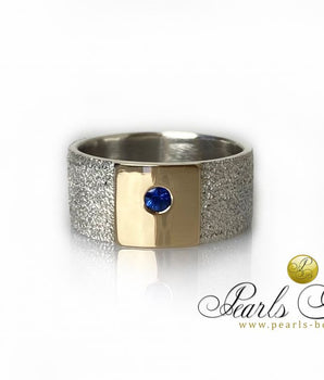 Sterling Silver and 14k gold ring with blue sapphire