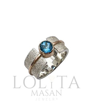 Silver and gold ring with Swiss Blue topaz 6mm