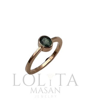 Gold ring with green sapphire