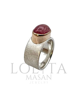 Silver ring with tourmaline in gold frame