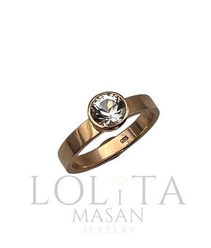 Gold ring with topaz