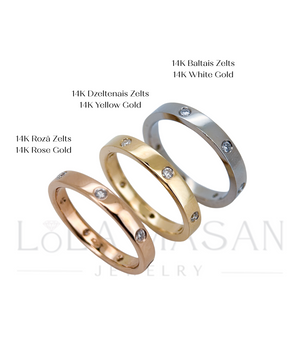 3mm wide 14K gold ring with 7 gemstones