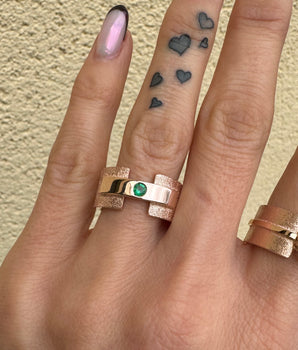 Rose gold ring with emerald