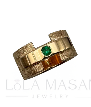 Rose gold ring with emerald