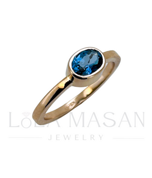 14K gold ring with London Blue topaz