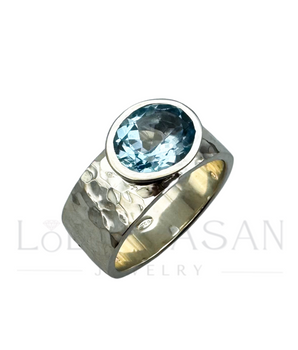 Sterling silver ring with a blue topaz Sky Blue